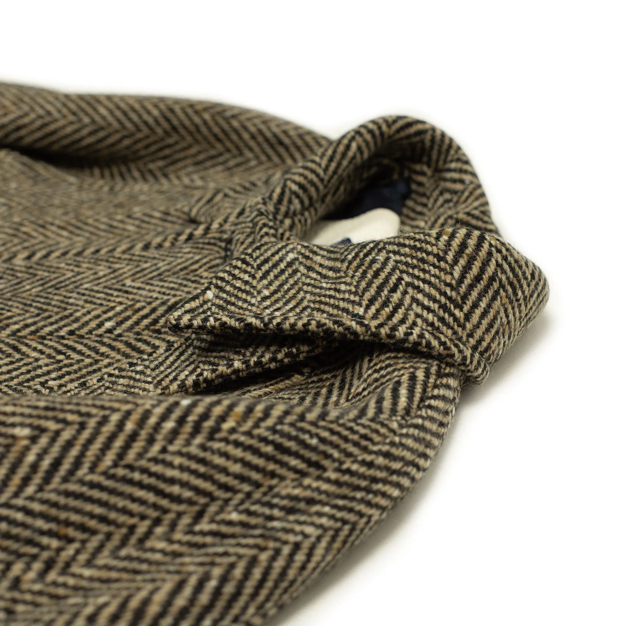 Belted balmacaan in oatmeal and black herringbone wool donegal tweed