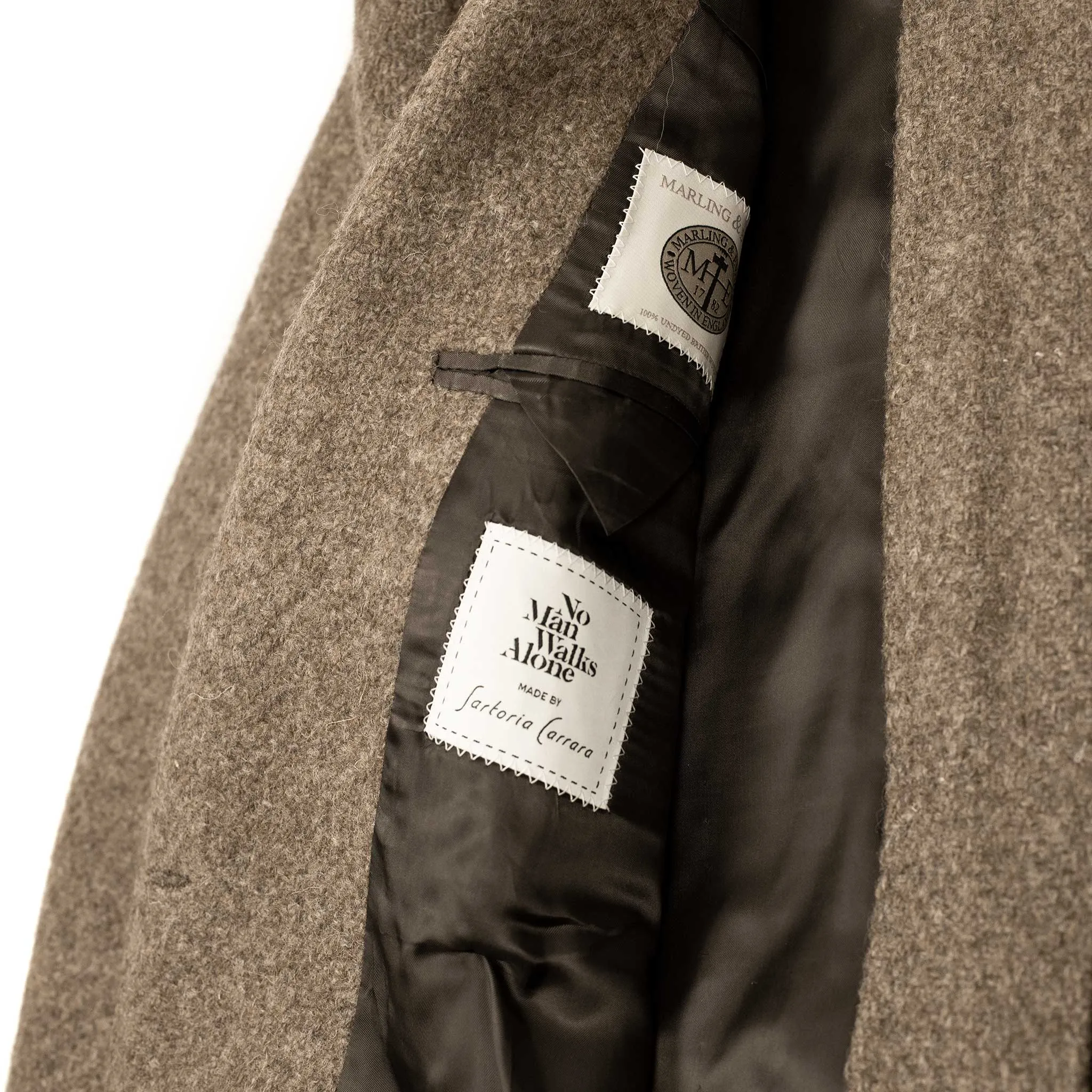 x Sartoria Carrara: Ulster double-breasted coat in camel color hopsack undyed wool